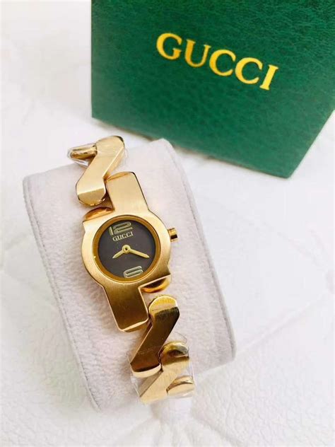 rolex and gucci bag|Gucci zig zag watch.